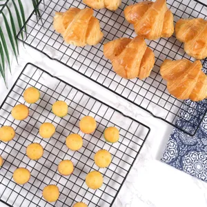 Black wire cooling racks set for baking cookies, bread, and cakes, durable kitchen tool.