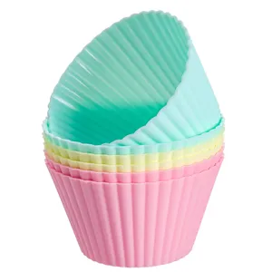 Silicone cupcake mold detail close-up, flexible and heat resistant baking cup, pastel colors.