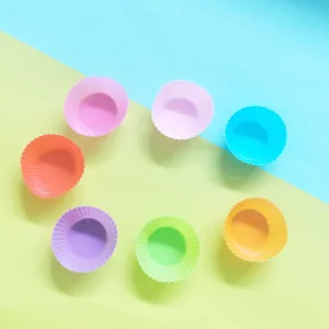 Colorful silicone muffin cups for baking cupcakes, flexible and heat-resistant molds.