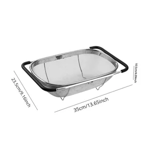 Cesta colador extensible para fregadero de cocina de acero inoxidable con asas ajustables.