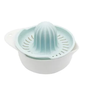 Manual lemon squeezer citrus juicer orange press with filter and container detail view