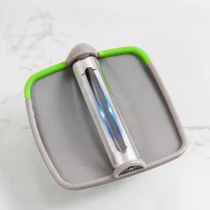 Pelador de Frutas y Verduras de Acero Inoxidable con Dito Creativo Herramienta de Cocina de Plástico