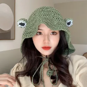Green crochet frog bucket hat for women, cute handmade knit sun hat with chin ties.