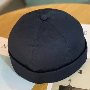 Cappello docker in cotone blu scuro, cuffia classica per la moda streetwear estiva e casual.