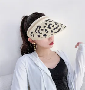 Stylish leopard print straw sun visor hat for women, open top summer beach hat UV protection.