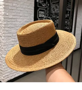 Sommer handgefertigte breite Krempe flache Strohhut für Damen, elegante schwarze Schleife.