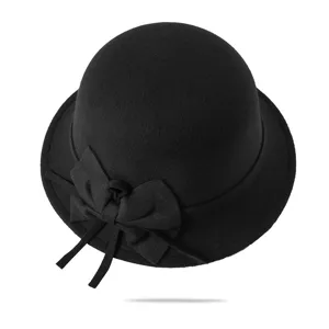 Black felt cloche hat detail, winter warm woolen bowler hat with elegant bow decoration for women.