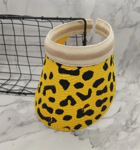 Summer empty top straw sun hat with stylish animal print pattern and comfortable elastic band.