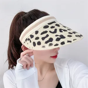 Summer straw sun visor hat with chic animal print, empty top design for comfortable wear.