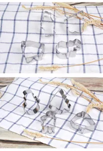 Stainless steel Christmas cookie cutter set detail view showing cute festive shapes.