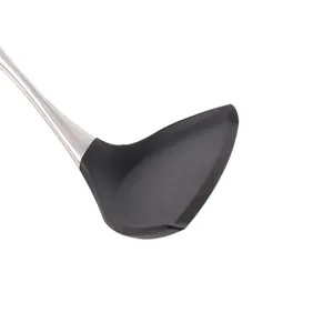 Silicone kitchen spatula with stainless steel handle, heat resistant cooking tool detail.