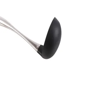 Stainless steel handle and heat-resistant silicone soup ladle kitchen utensil detail view.