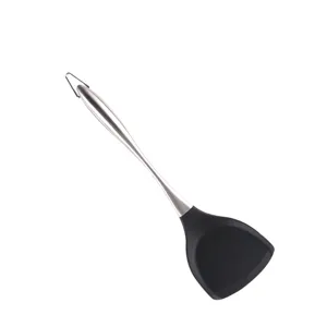 Silicone spatula detail view, flexible non-stick turner with stainless steel handle.