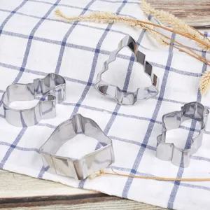 Stainless steel Christmas cookie cutter set 4 pieces baking molds for DIY holiday pastries.