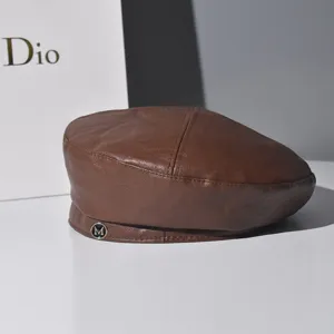 Brown PU leather beret for women autumn winter retro painter hat with metal letter M decor.