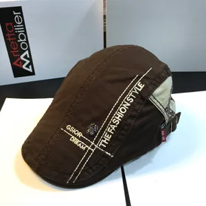 Men's brown flat cap stylish casual duckbill beret with embroidered letters and skull decor.