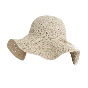 Beige crochet straw sun hat detail, wide brim beach vacation foldable summer sun visor.