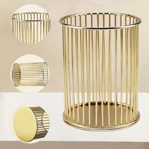 Gold metal wire pen holder, cylindrical desk organizer and makeup brush storage basket.