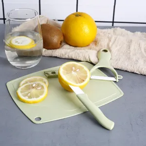 Ceramic fruit knife three-piece set with cutting board and peeler for home kitchen use