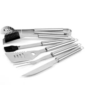 Stainless steel BBQ tool details, durable metal grill spatula fork and tongs close-up view