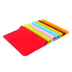 Detailed view of colorful flexible silicone pastry rolling dough mats, non-stick baking pad.