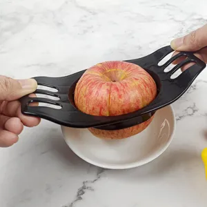 Plastic apple slicer fruit cutter kitchen tool with stainless steel blade for easy coring.