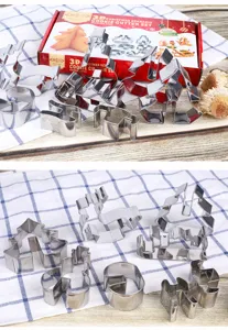 8-piece 3D Christmas stainless steel cookie cutter set with various holiday shapes.