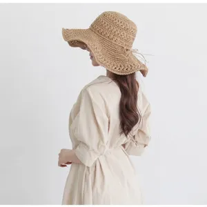 Wide brim woven straw hat for women, fashionable bohemian summer beach sun hat, foldable.