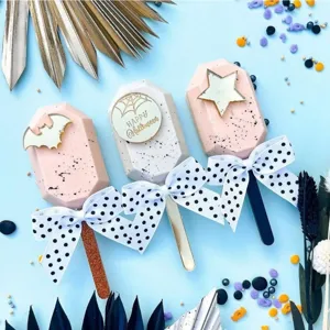 Halloween party acrylic cake decoration set with cute bat star and polka dot bow designs.