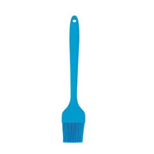 All-in-one silicone pastry brush in bright blue color with hanging hole for kitchen baking.