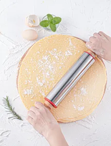 Stainless steel rolling pin with wooden handle and silicone ring for baking dough.