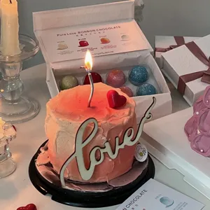 Wooden love cake topper with red resin heart, perfect Valentine Day birthday cake decoration.