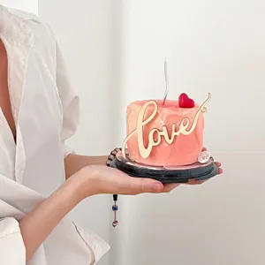 Valentine's Day wooden love cake topper decoration featuring cute red resin heart ornament.