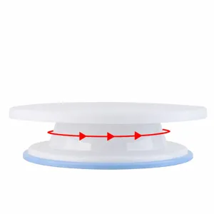 Alzata girevole per torte in plastica bianca con base antiscivolo per decorare dolci.