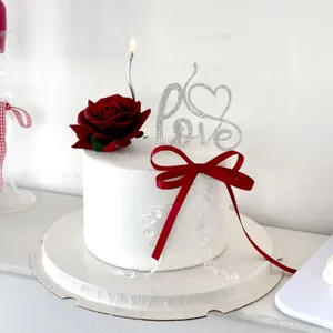 Valentine's day cake topper set with rhinestone love letter, red rose and candle detail.