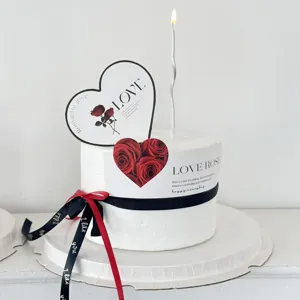 Valentine's day cake decoration set with rose heart cards, ribbon and candle for baking.