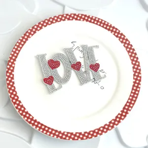 Rhinestone LOVE cake topper with red hearts, perfect for Valentine's day party decoration.