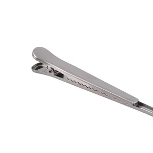 Stainless steel coffee measuring spoon with sealing clip for kitchen food powder storage.