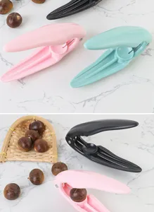 ABS plastic chestnut clip detail view showing ergonomic handle and blade design in colors.
