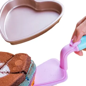 Push type cake spatula set with heart shaped baking pan, ideal for cutting and serving sweet cakes.