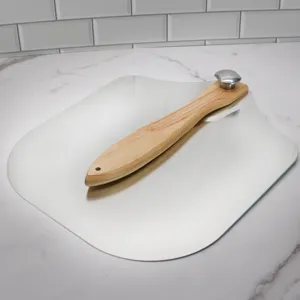 Aluminum square pizza peel with wooden handle, durable baking transfer tool for homemade pizza.