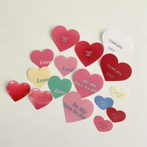 Valentine heart cake decorations and stickers set detail view showing cute romantic design.