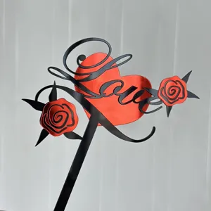 Valentine's Day cake topper with red heart and roses, black acrylic cursive Love insert.