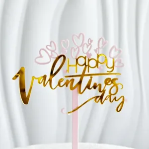 Gold acrylic Happy Valentine's Day cake topper detail shot, romantic dessert decoration view.