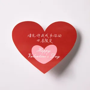 Heart-shaped Valentine's Day cake decoration sticker, romantic couple baking accessory.