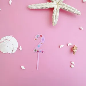 Pink acrylic number 2 cake topper with ocean seashell starfish design for birthday party decor