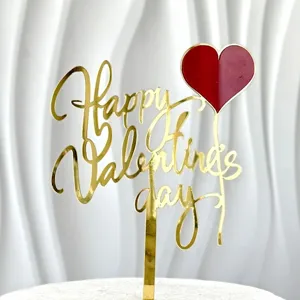 Gold acrylic Valentine cake topper detail, red heart balloon design, party decor.