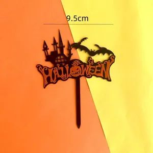 Halloween acrylic cake topper detail view, black castle and bat design, 9.5cm size insert.