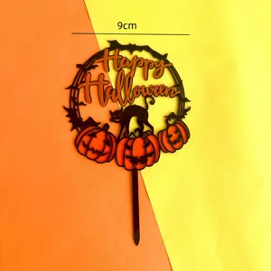Detailed view of acrylic Halloween cake topper featuring black cat, pumpkins and bats design.