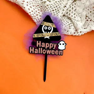 Halloween acrylic cake topper with spooky skull, ghost and warning signs for party decor.